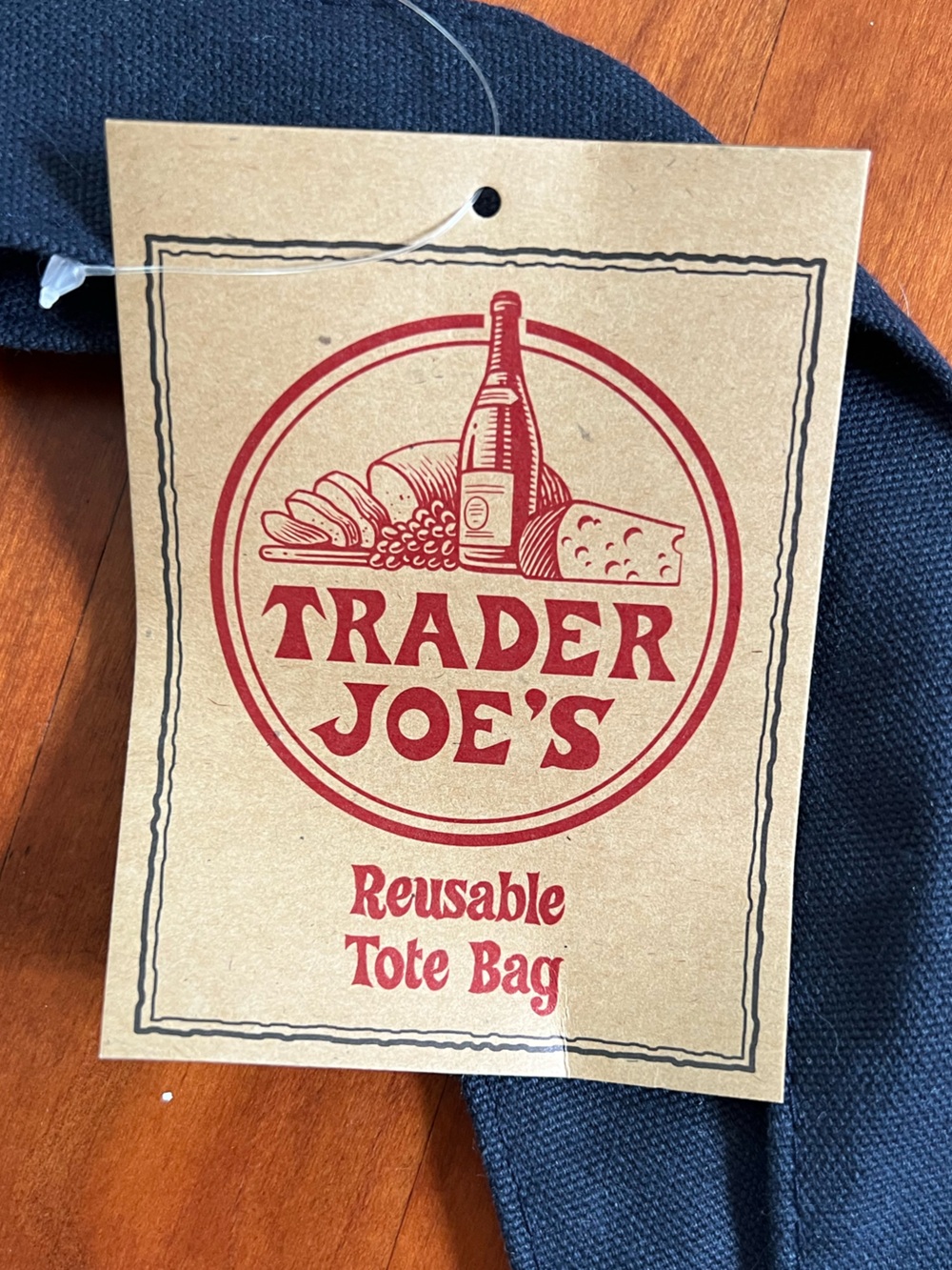 NWT Trader Joe’s Original Large Reusable Tote Bag in cream with navy blue handle - Picture 4 of 7